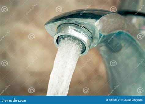 Flowing Water From The Tap Stock Image Image Of Faucet 208950131