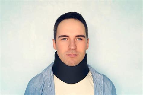 Premium Photo Man With Neck Brace After Whiplash Injury Blue