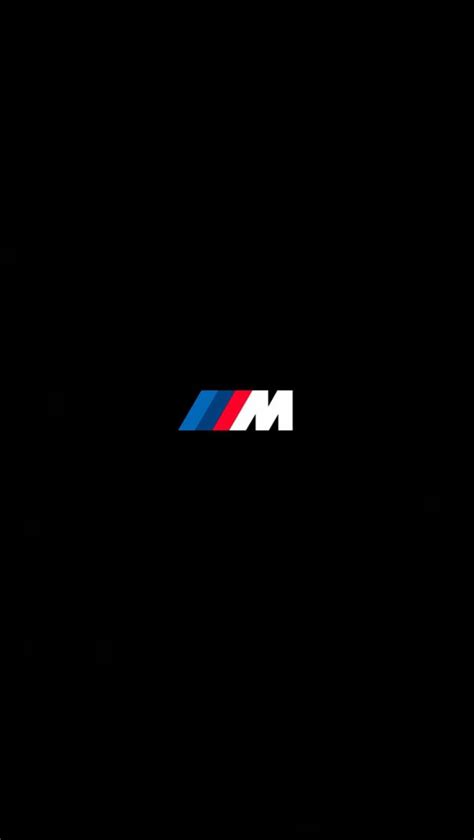 The Bmw Logo Is Shown On A Black Background With Red White And Blue