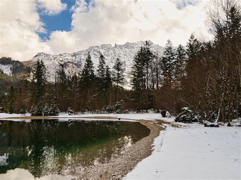 Premium Photo | Winter atmosphere at the small mountain lake offensee ...