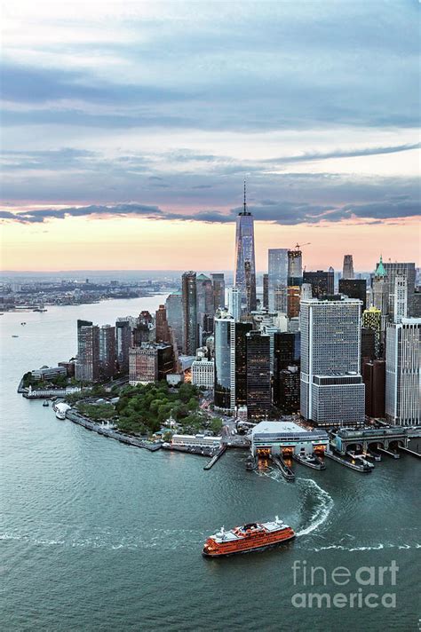 Aerial Of Lower Manhattan Skyline With Staten Island Ferry Boat