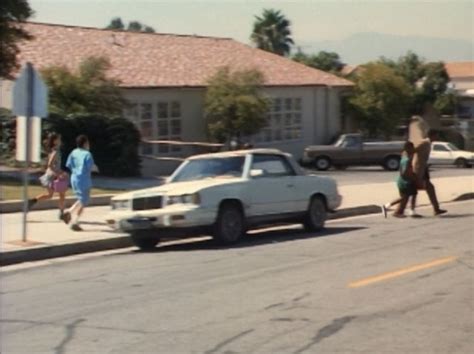 IMCDb Org 1986 Chrysler LeBaron Convertible In In The Line Of Duty