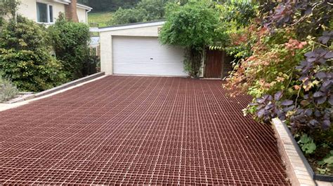 Ecogrid Terracotta Permeable Paving Installed On A Sloped Front