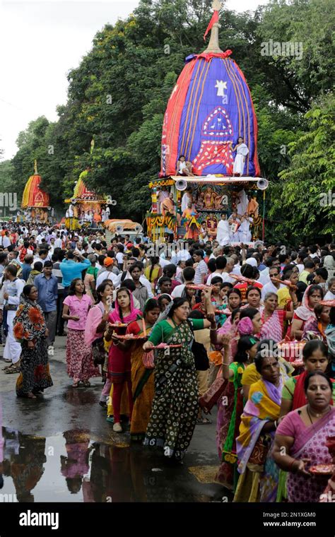 Hindu Devotees Pull The Chariots Of Hindu Deities Lord Jagannath