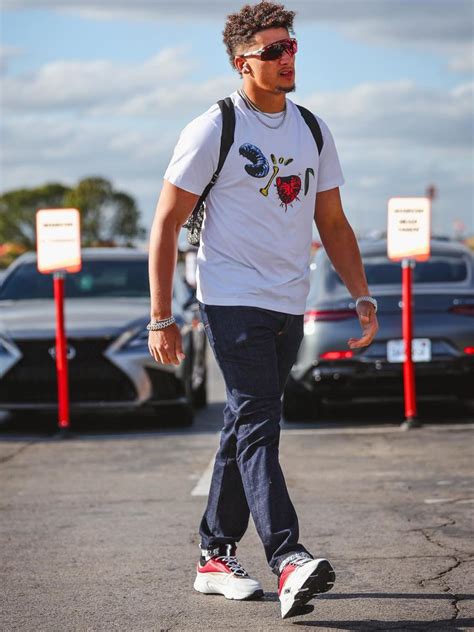 Patrick Mahomes: Oakley Orange Sunglasses & a Dior x Cactus Jack Tee ...