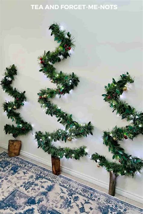 Easy And Cheap Diy Wall Christmas Tree To Save Space Tea And Forget Me Nots