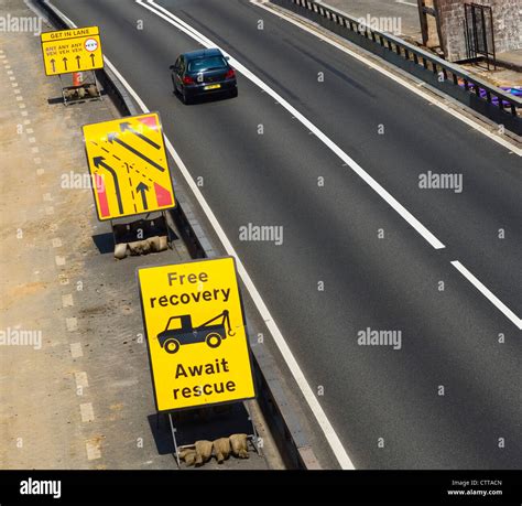 Motorway roadworks signs, UK Stock Photo - Alamy