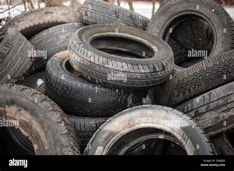 Rubber Tires In A Landfill Old Wheels From Cars Recycling Rubber