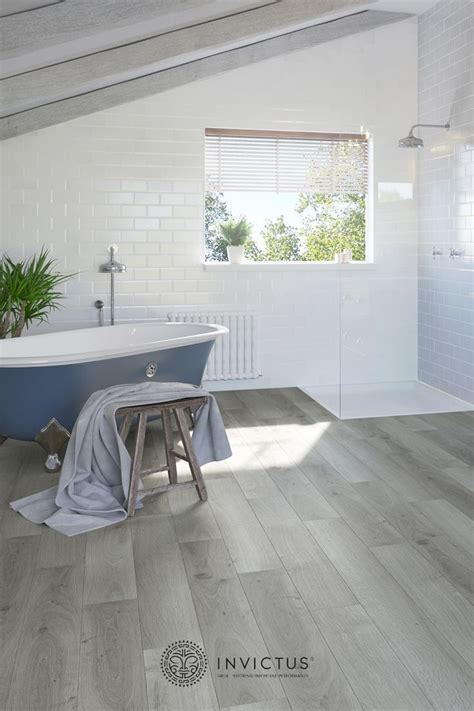 Grey Bathroom Flooring | Invictus Highland Oak Frosted LVT | Grey vinyl flooring, Grey flooring ...