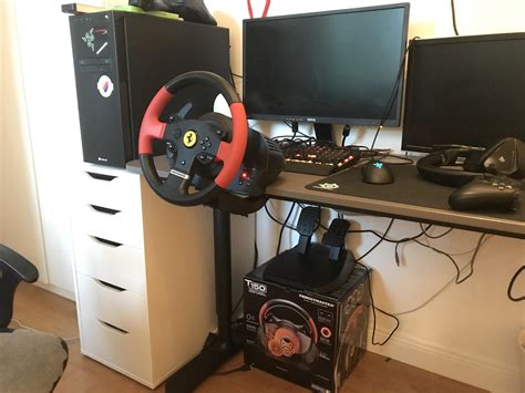 My first sim racing setup :D Hopefully in a couple years it'll be more ...