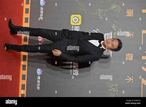 Chinese Actor Deng Chao Arrives On The Red Carpet For Sina Weibo