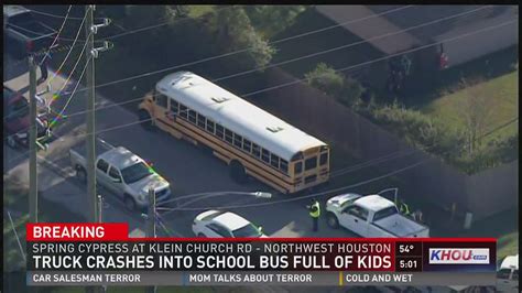 Truck crashes into school bus full of kids | khou.com