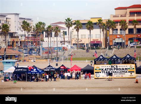 Surfers Competing In The Katin Pro Am Surf Competition At Huntington