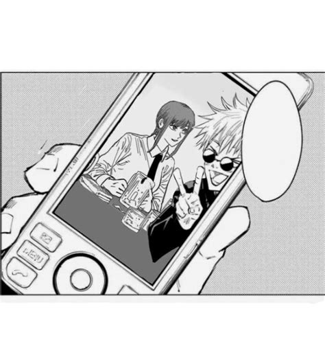 Someone Is Holding Up Their Cell Phone To Take A Picture With The Anime