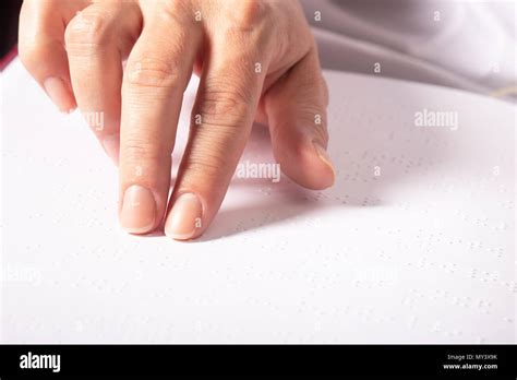 Blind Woman Read Book Written In Braille Close Up Finger Touch To