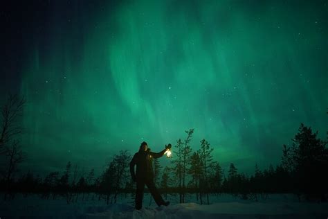 Northern Lights Hunting Photography In Rovaniemi Finland