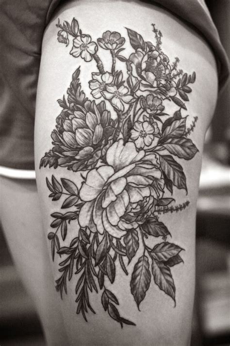 Wonderful Black Ink Flowers Tattoo On Thigh Tattooimages Biz