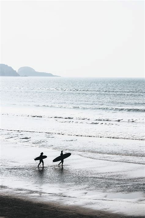 Hd Wallpaper Two People Carrying Surfboards At Beach During Daytime Two Person Holding