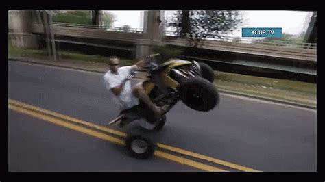 Moron Atv Rider Jousts With Car Loses Horrifically