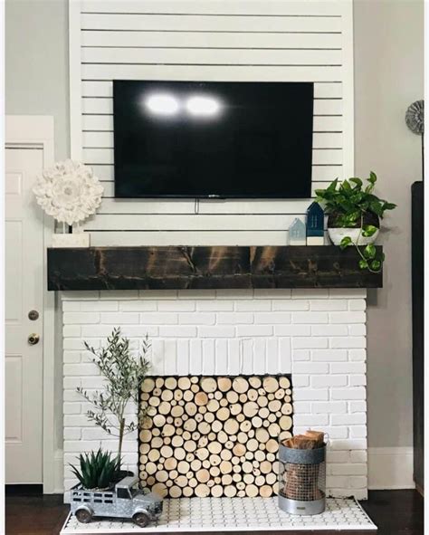 White Fireplace With Dark Wood Mantel Stacked Wood Soul Lane