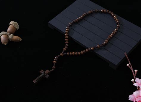 Wholesale 6 7mm Dark Brown Wood Cord Rosary Factorysuppliers