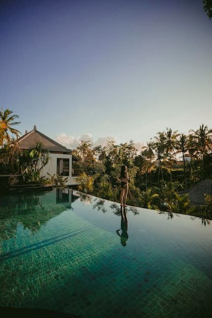 Premium Photo | The pool at the villa ubud