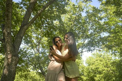 Happy Lesbian Couple Lying Together On Grass At Park Stock Image Image Of Life Length 234251845
