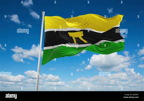 flag of Ashanti, africa at cloudy sky background, panoramic view. flag ...