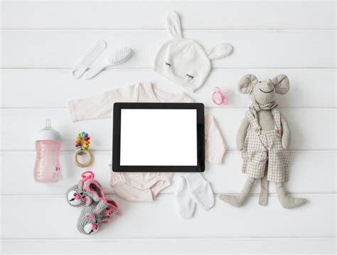 Premium Photo | Tablet computer and baby's items