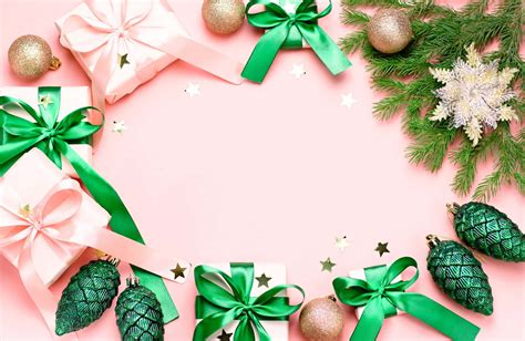 Download Christmas Presents On Pink Background With Green Ribbons