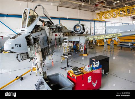 Airmen Perform Maintenance Work On An A 10 Thunderbolt From The 354th