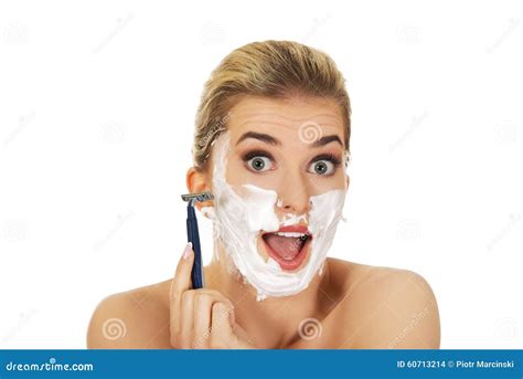 Young Shocked Woman Shaving Her Face With A Razor Stock Photo - Image ...