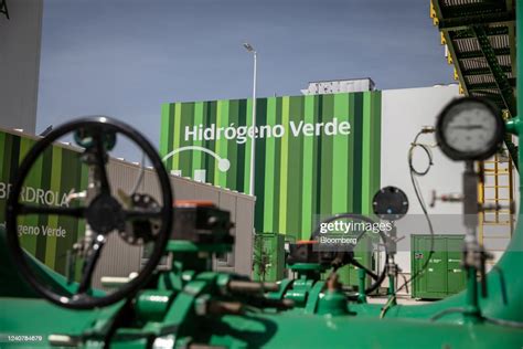 A Green Hydrogen Sign On The Exterior Of The Electrolyzer During The