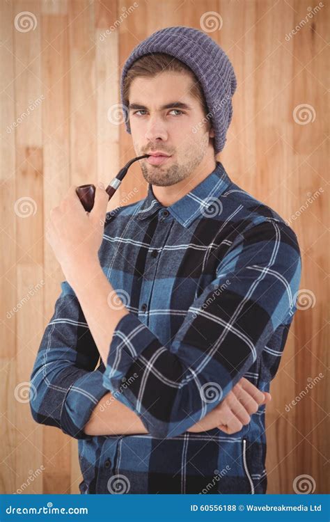 Portrait Of Hipster Holding Smoking Pipe Stock Photo Image Of