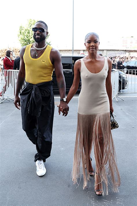 Gabrielle Union, Dwyane Wade wear see-through Prada tanks