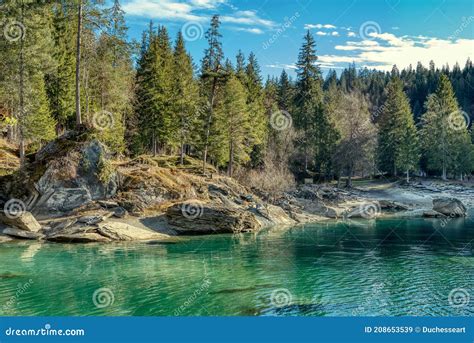 Beautiful Nature Scene At Mountain Lake Caumasee In The Swiss Alps