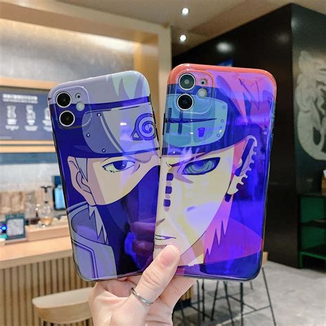 Download Kakashi Hatake and Pain Face Off in Intense Showdown Wallpaper