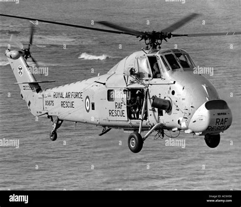 Wessex Air Sea Rescue helicopter from 1980 s in flight over the sea at ...