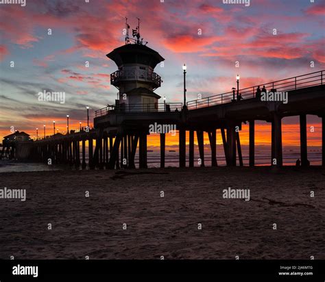 Huntington Beach Pier At Sunset A Moment Of Beauty And Bliss Before An