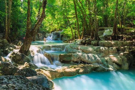 Waterfall With Sun Ray In Tropical Deep Forest At Erawan National Park