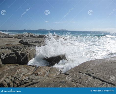 Wave Hitting Australian Rocky Coast And Beach With Giant Rocks Stock