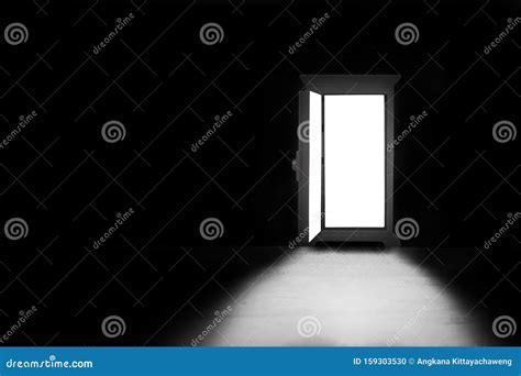 Light Shining Through Opened Door In Dark Room Stock Photo Image Of