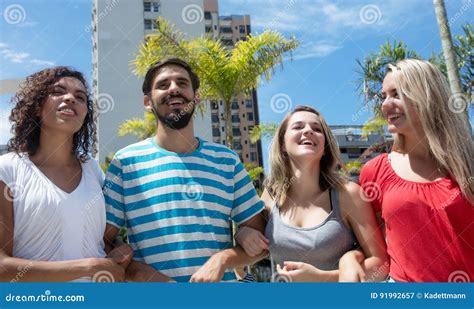 Group Of Happy Caucasian And Hispanic Woman With Latin Man Stock Image