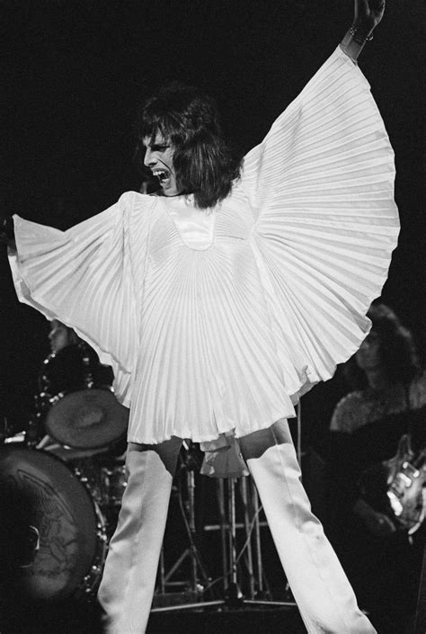 The Most Iconic Looks From Freddie Mercury Queen Freddie Mercury Freddie Mercury Queen Band