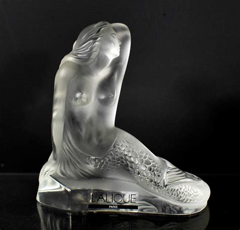 Lot 153 A Lalique Frosted Glass Paperweight Figure