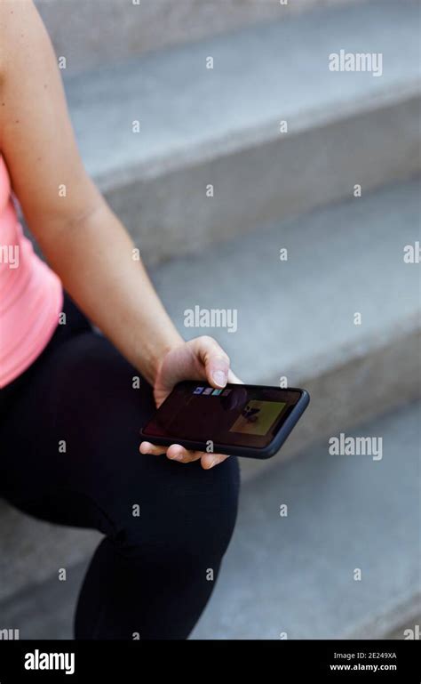 Womans Hand Holding Cell Phone Stock Photo Alamy