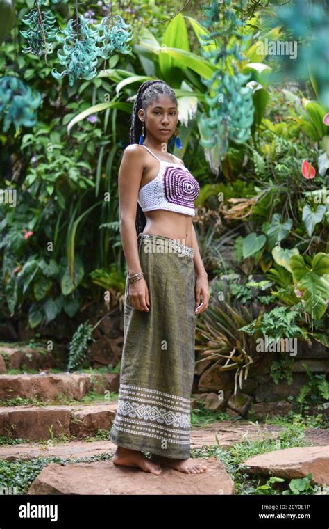 Young afro Colombian woman in garden Stock Photo - Alamy