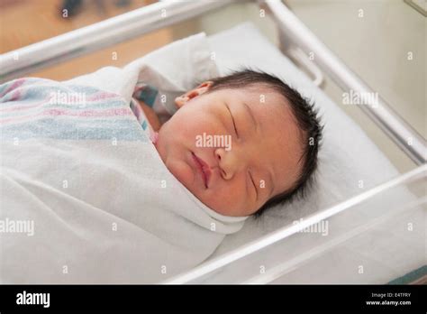 Newborn Baby Girl In Hospital Bassinet Stock Photo Alamy