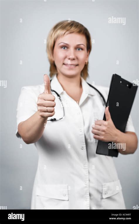 Doctor Showing Thumbs Up Gesture Stock Photo Alamy