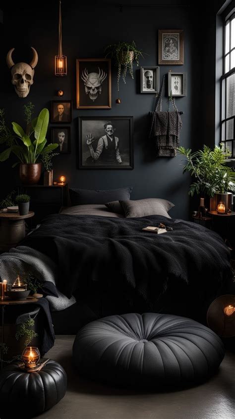 a bedroom with black walls and pictures on the wall